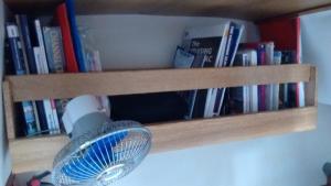 56.Bookshelf in rear cabin with fan